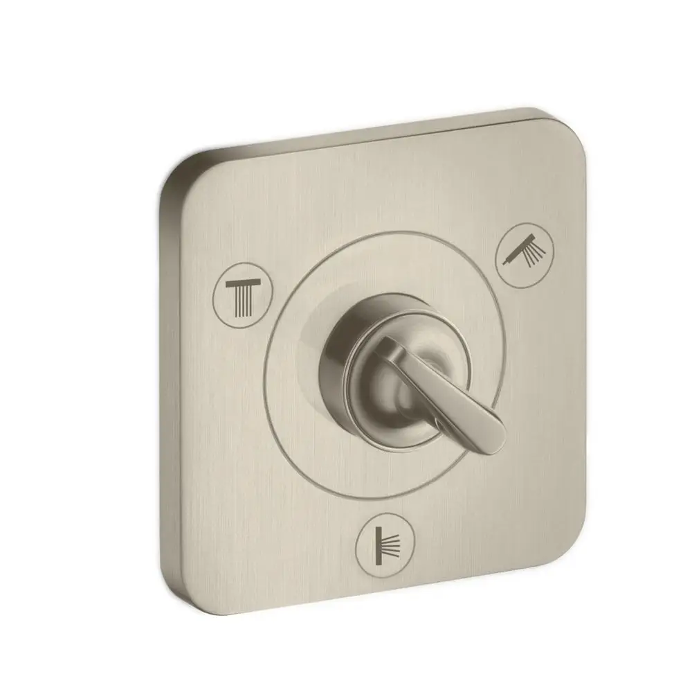 Umstellventil in gebürstetem Nickel-Finish von AXOR, mit Drehschalter in der Mitte und Symbolen für Funktionen auf der Oberfläche. Unterputzmontage möglich.
